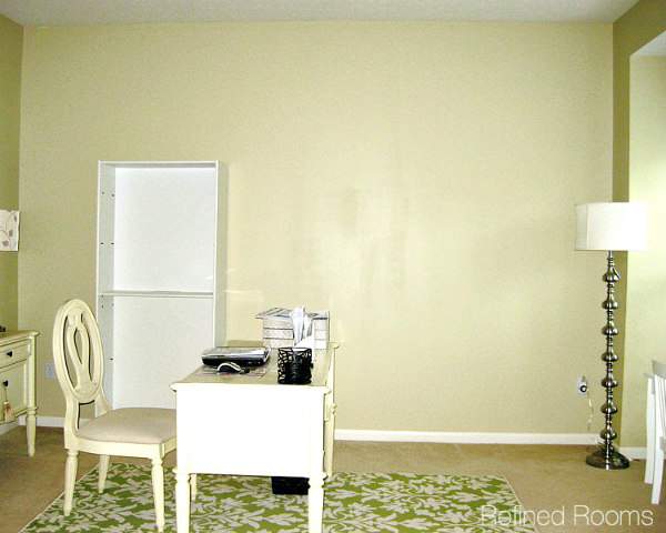empty room being decorated and furnished as part of a home office makeover.
