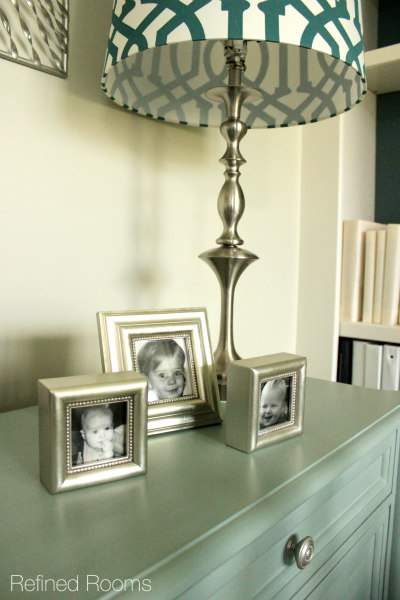 home office file console with photographs.