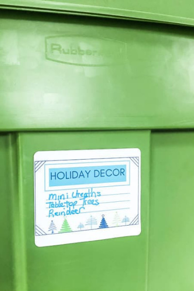 Holiday decor storage bin with label.