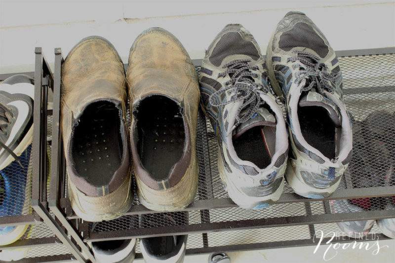 Grungy shoes stored in the garage.
