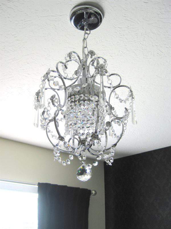 Although pretty, this light fixture will need to replaced when I transform this guest room into a modern homework/craft room in the One Room Challenge