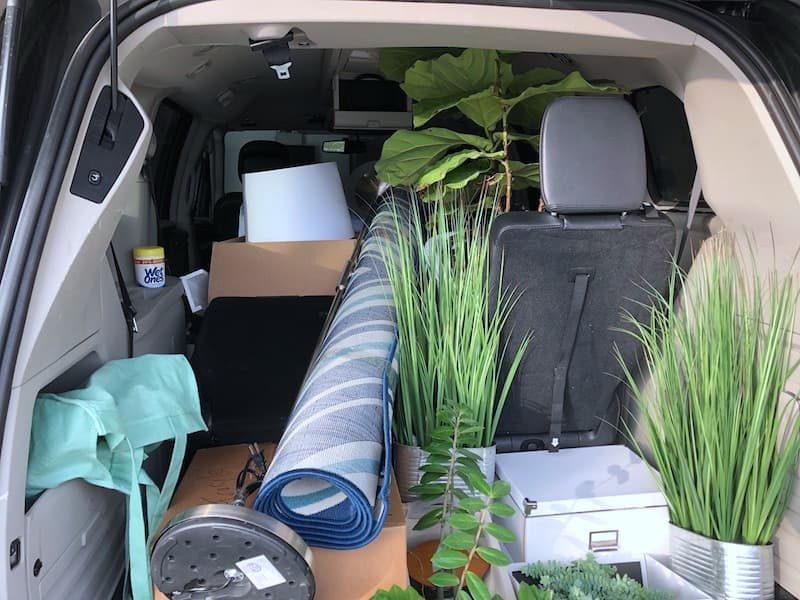 a mini van transporting household items during a move.