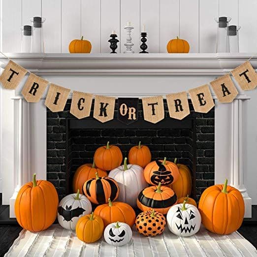 Trick or treat banner on fireplace