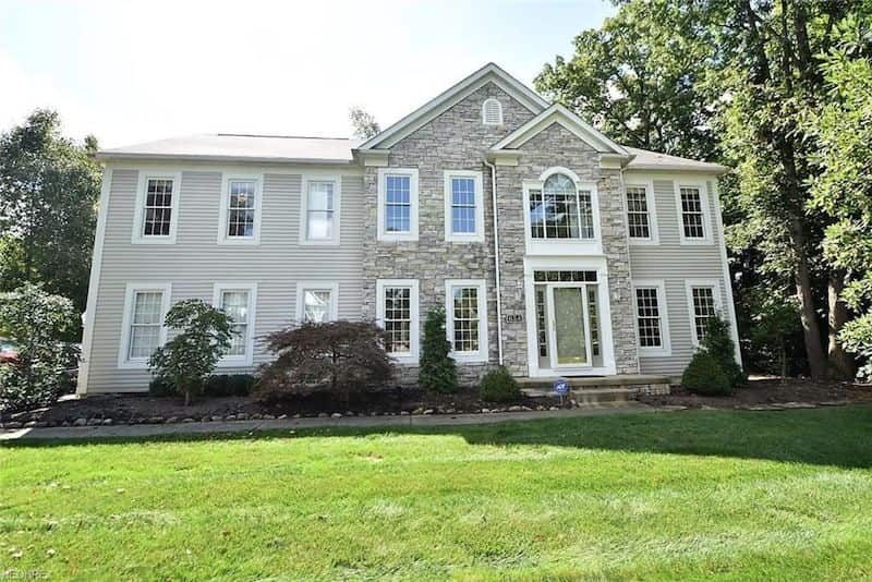 front exterior view of a home in the summer.