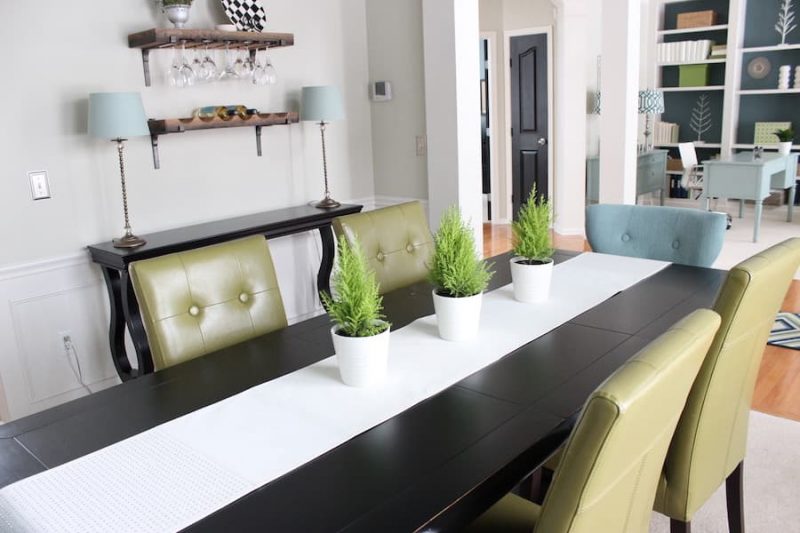 example of using live plants to decorate staged dining room