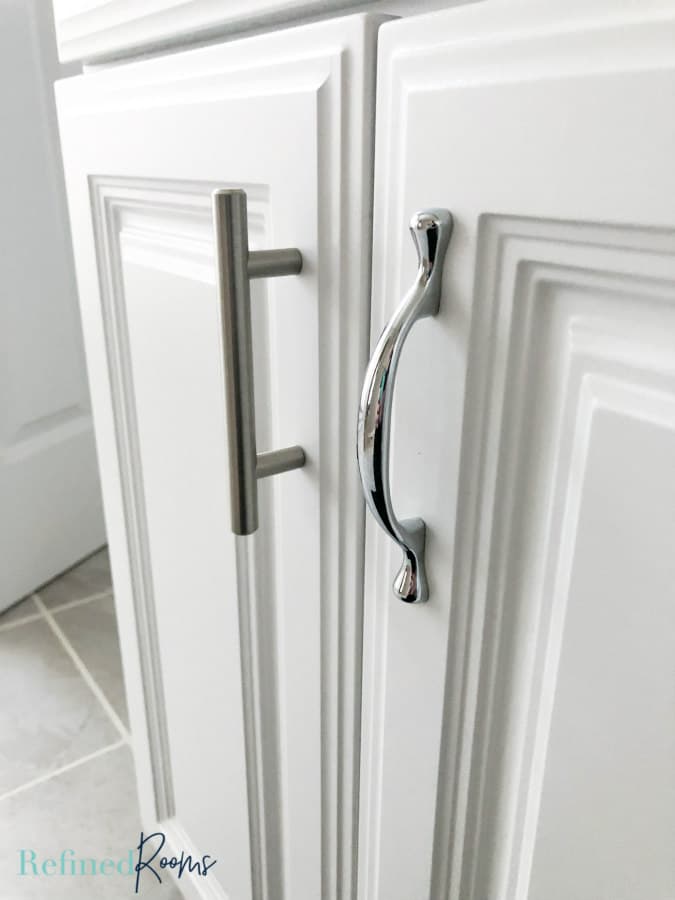 updated cabinet hardware in a bathroom - a stuck at home diy home project
