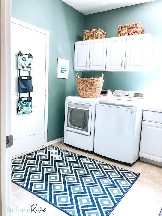 laundry room with geometric indoor-outdoor rug.