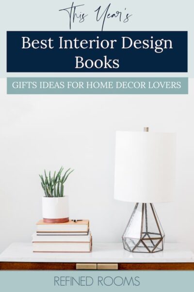 table with lamp, plant and books - text "This Year's Best Interior Design Books".